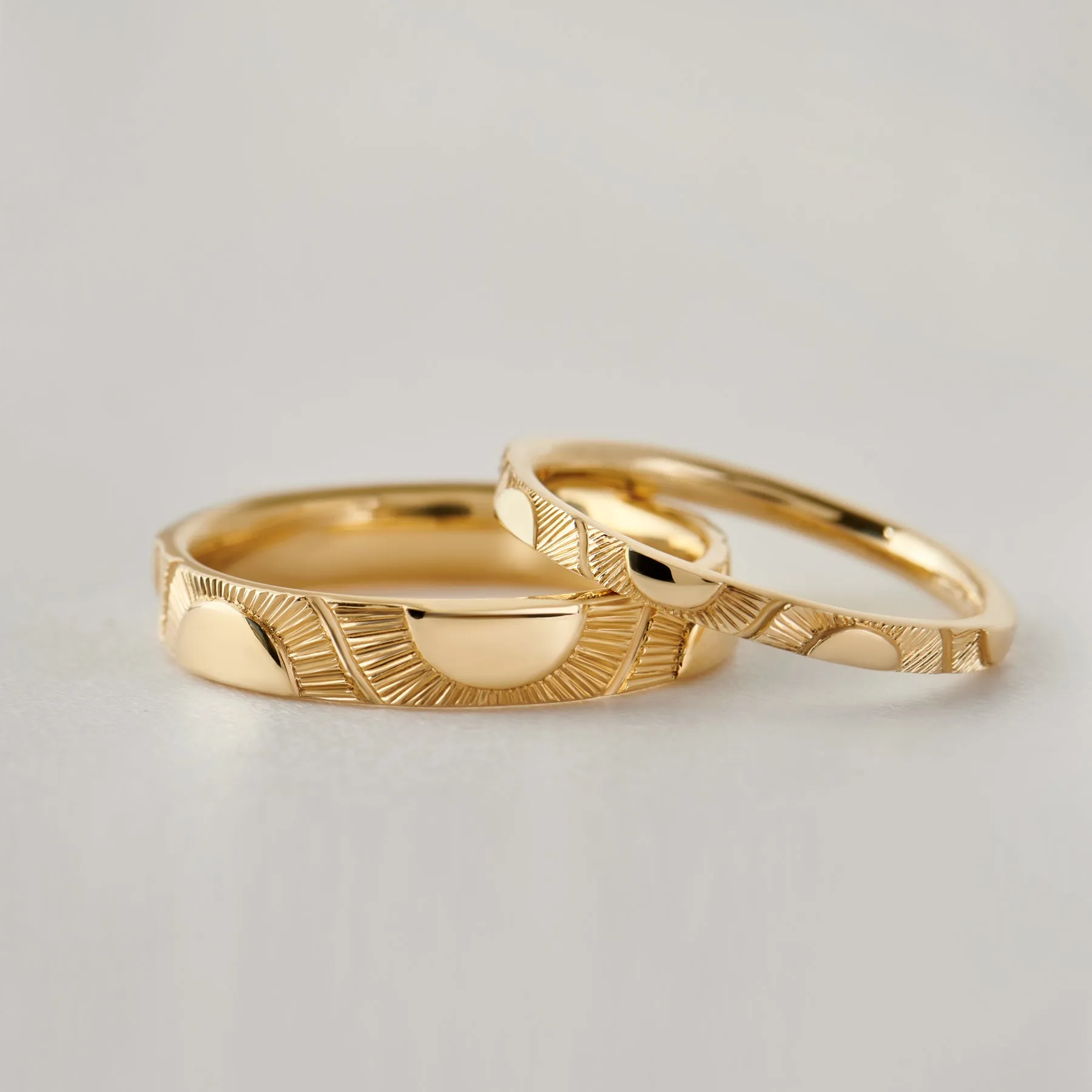 Big Sun and Little Sun - Hand Engraved Wedding Band Set